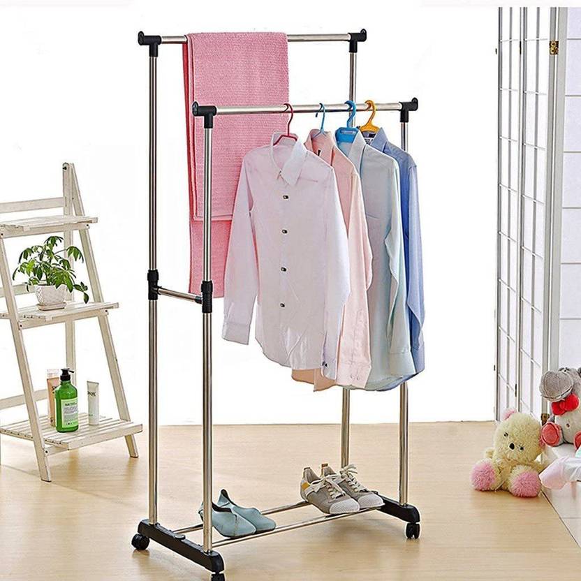 Double Pole Movable Cloth Hanger Organized with Clothes and Shoes.