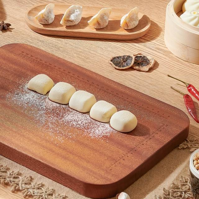 Dough is Placed On the Top Of Ecoco Ebony Wooden Chopping Board.