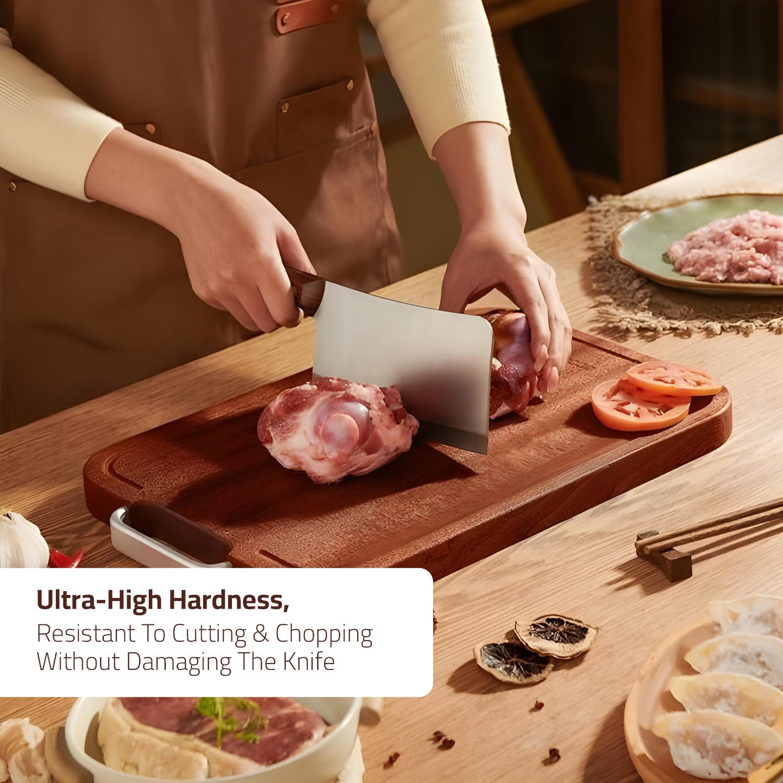 Someone is Cutting Meat On the Ecoco Ebony Wooden Chopping Board.