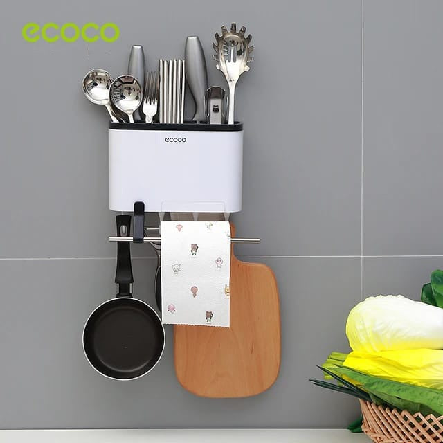 Ecoco Utensil Storage Rack placed on the wall with some items in it