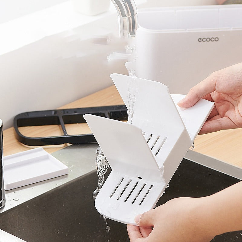 Someone cleaning Ecoco Utensil Storage Rack