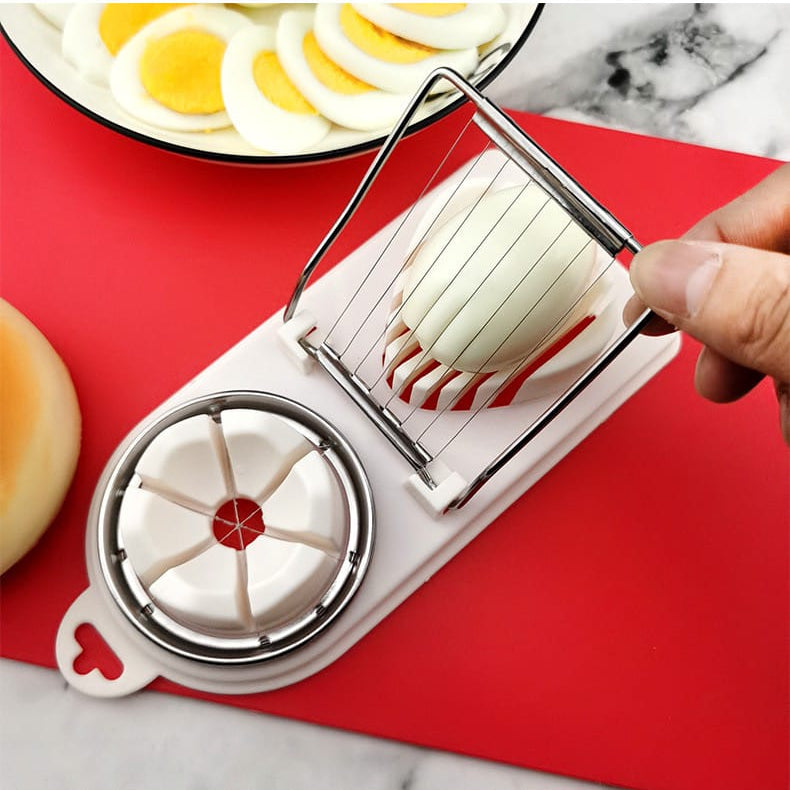 A Person is Slicing Egg Using Heavy Duty Manual Egg Slicer