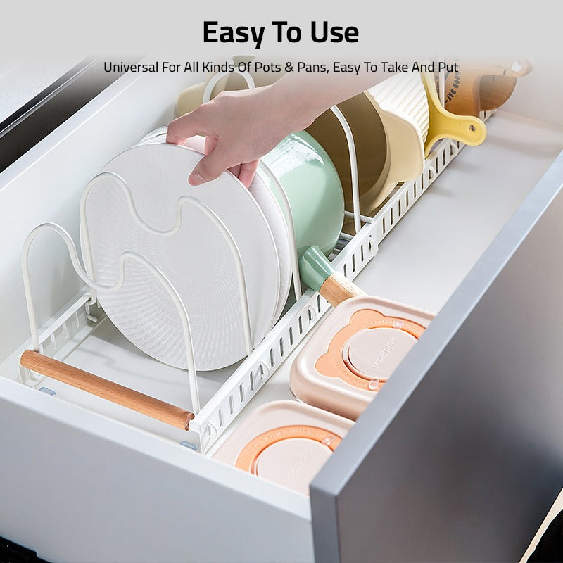 A Person is Taking Plates From Expandable Pot and Pan Organizer Rack Organized with Pans and Plates.