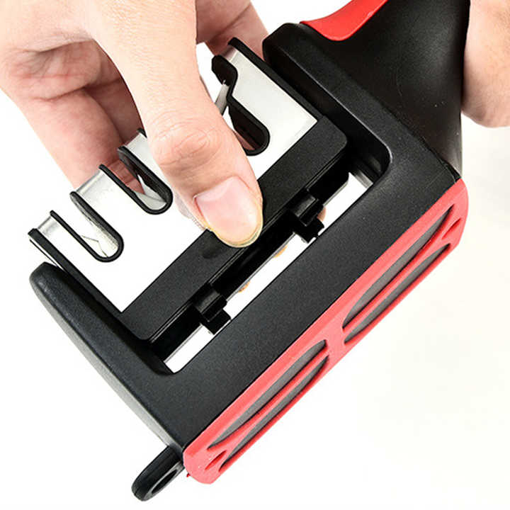 A Person is Fixing Blade Of Kitchen Knife Sharpener.