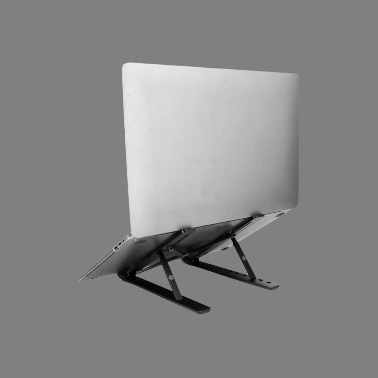 Foldable Aluminum Laptop Holder Rack In Black Color.