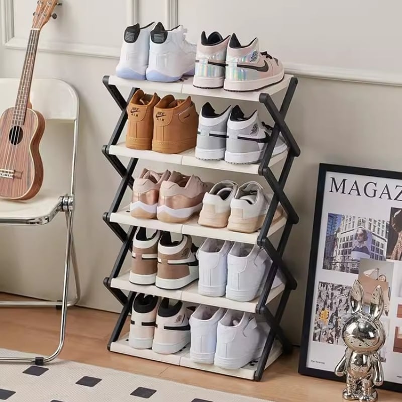 Foldable Multi-Layer Shoe Rack Shelf placed on the floor next to a guitar