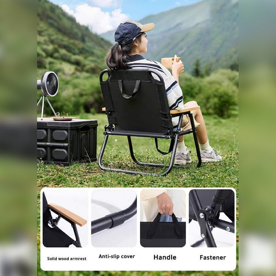 A Woman is Resting On Folding Camping Chair.