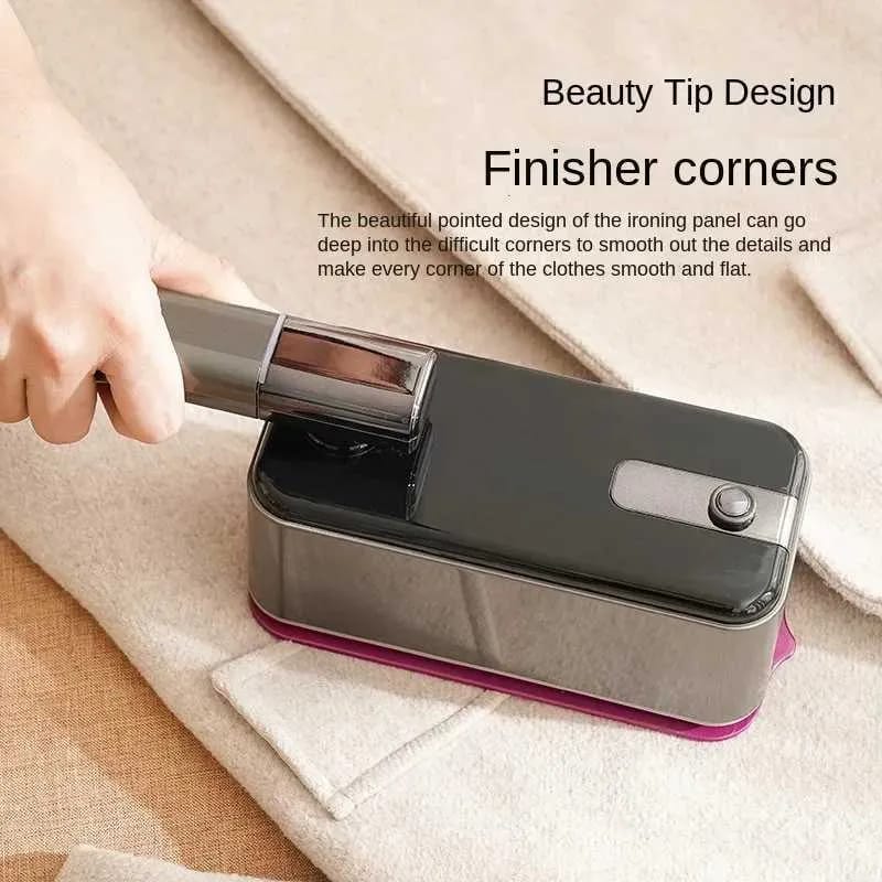 A Person is Ironing Garment Using Folding Electric Steam Iron.