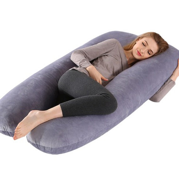 A Woman Is Resting on Full Body Pregnancy Pillow.