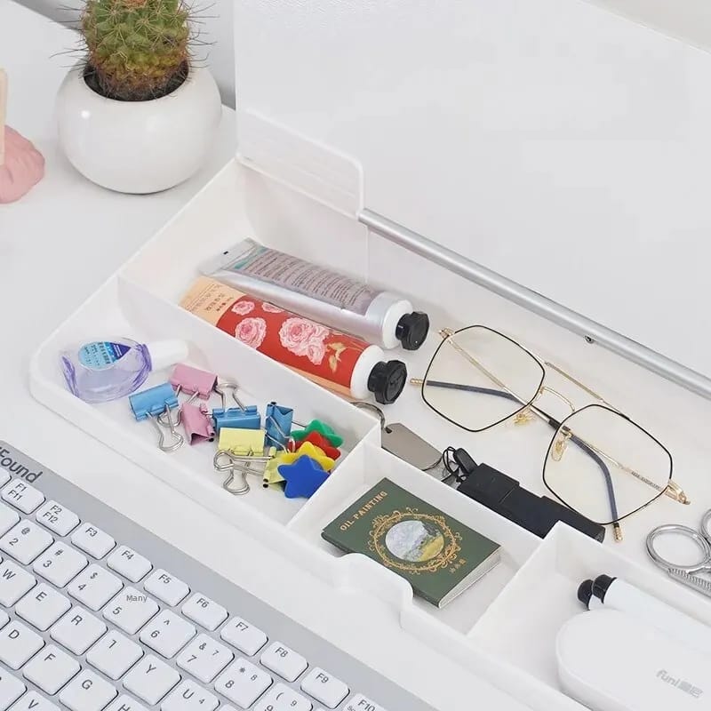 Multifunctional Glass Desktop Box next to some items