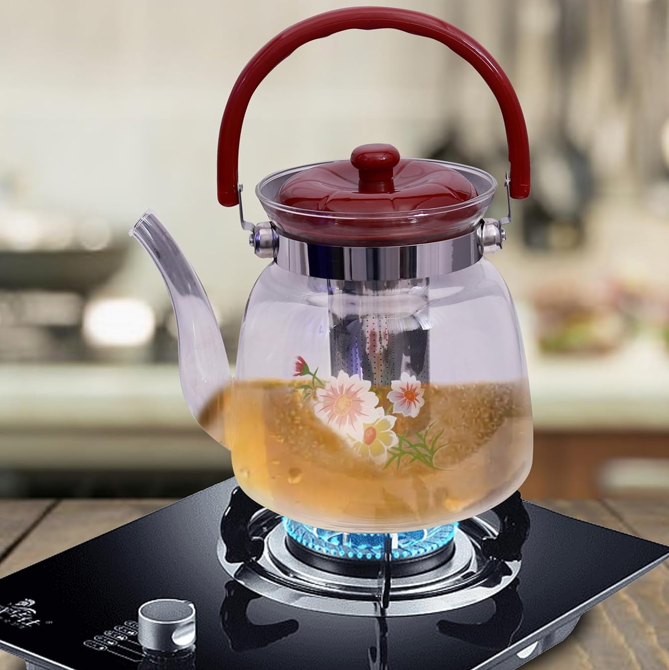 A Glass Tea Jug & Coffee Pot is Placed on a Heat Flame.