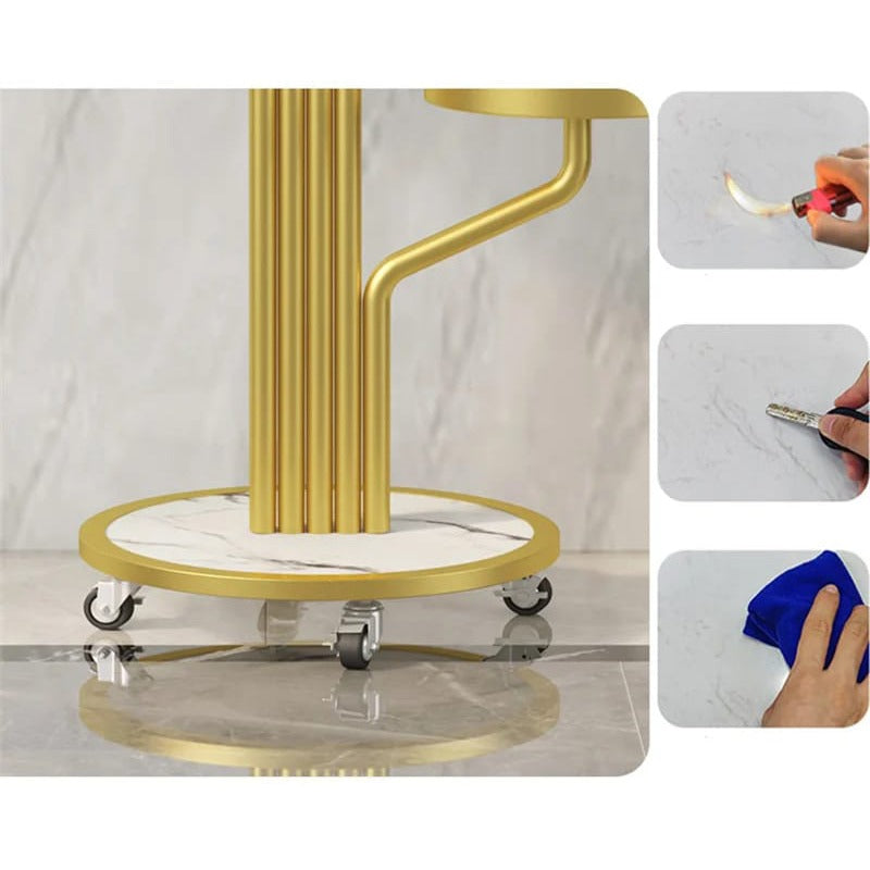 A Person is Ensuring the Quality Of Golden color Indoor Plant Stand.