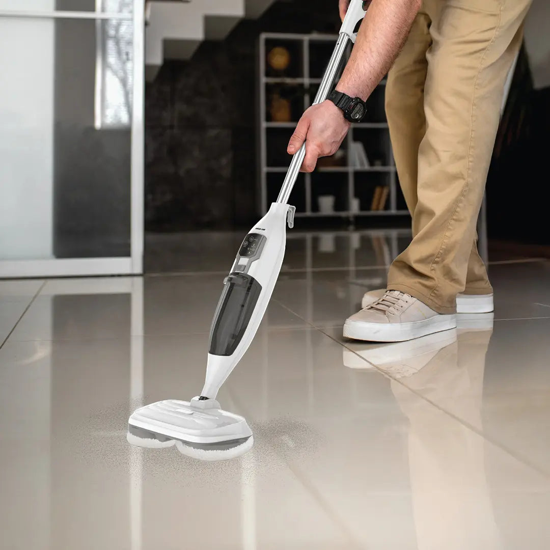 A Man is Using Green Lion Hydro Mop 3X – 1300W Electric Rotary Mop Cleaner to Clean Floor.