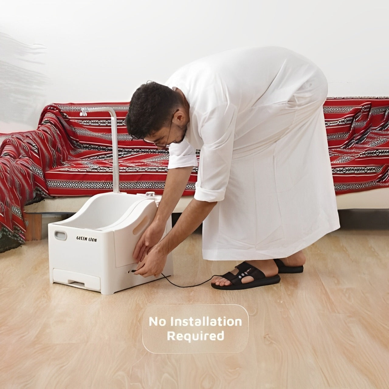 A Person is Setting Green Lion GWM-10 Portable Wudu Machine