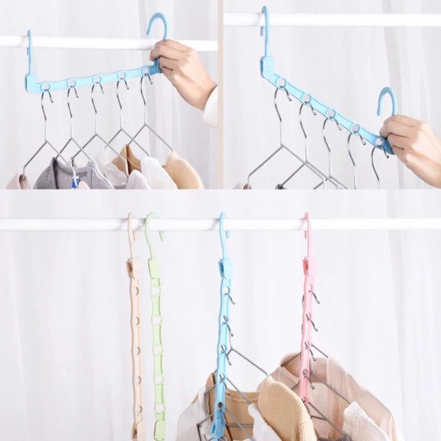 A collection of garments hanging on Multifunctional Adjustable Hook Cloth Hanger, organized on a rack