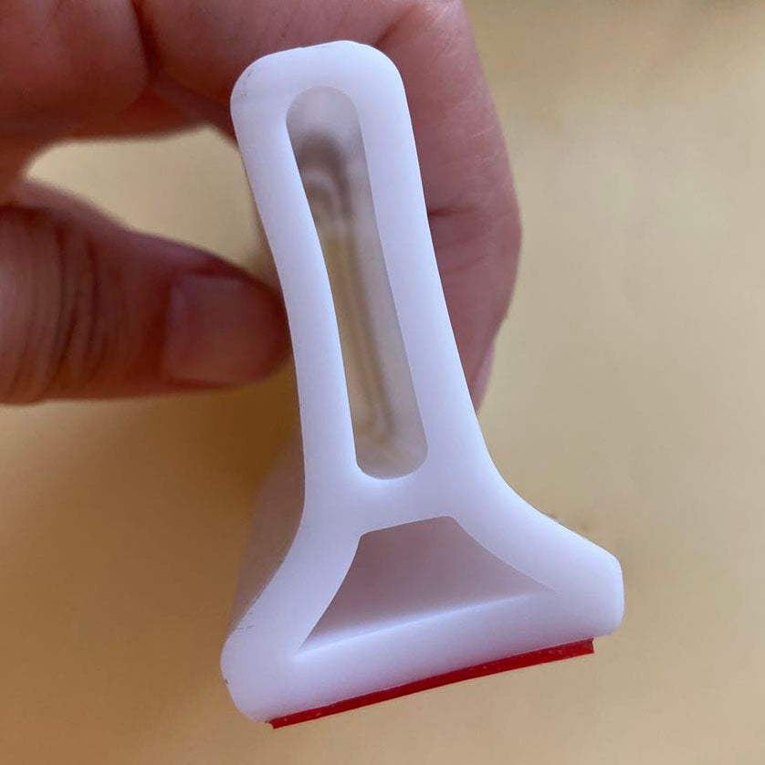 Someone holding a Silicone Water Separator Barrier