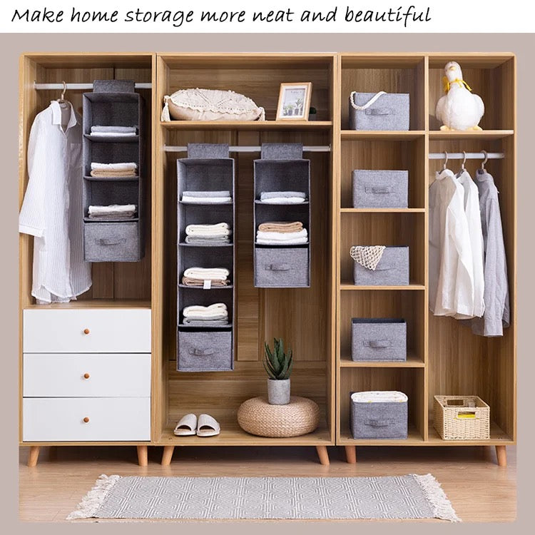 Wardrobe clothes storage bags placed on the shelf