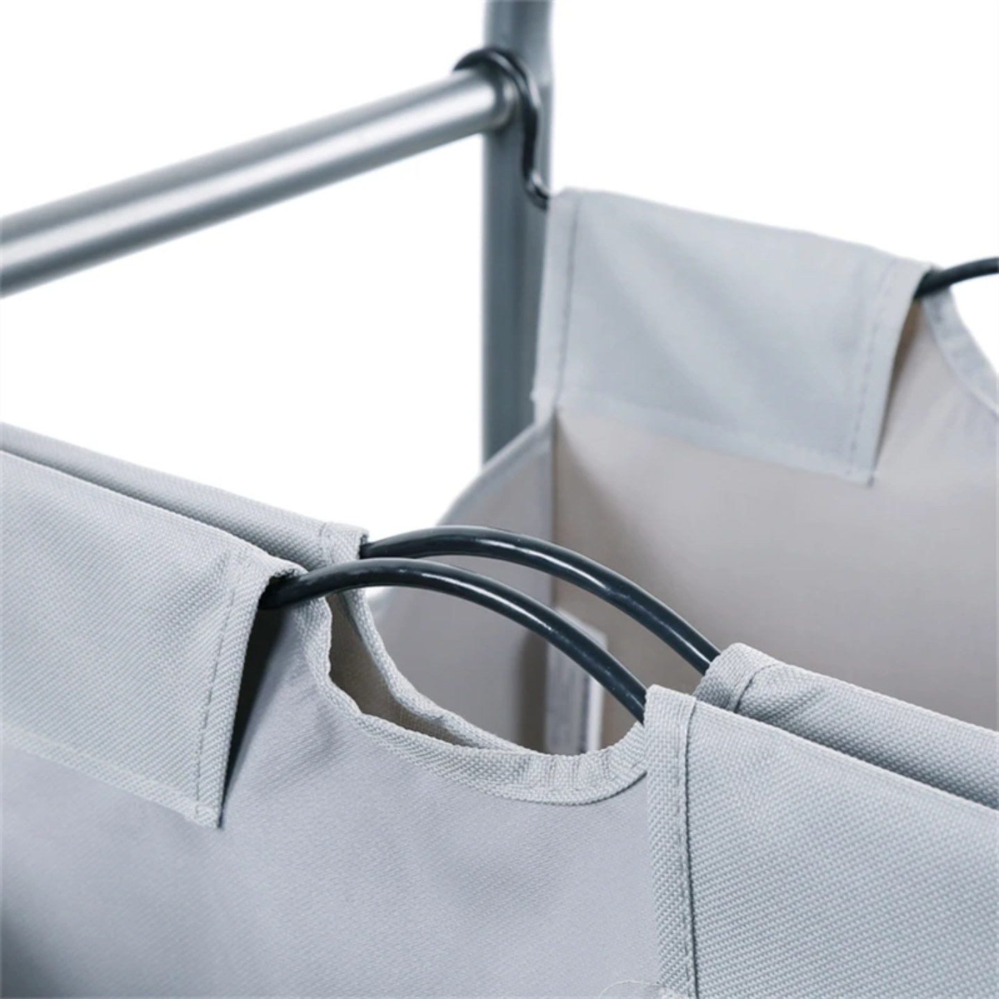 Handle Of Bags Of Heavy Duty Laundry Sorter Cart.