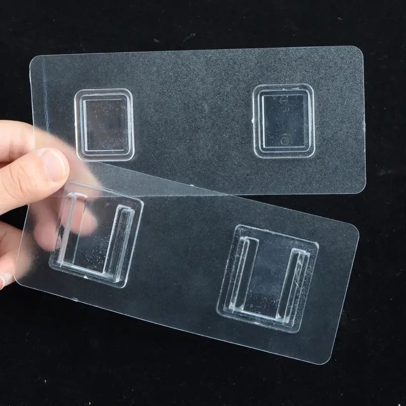 A Person is Holding Double Sided Adhesive Wall Hook Hanger Strip.