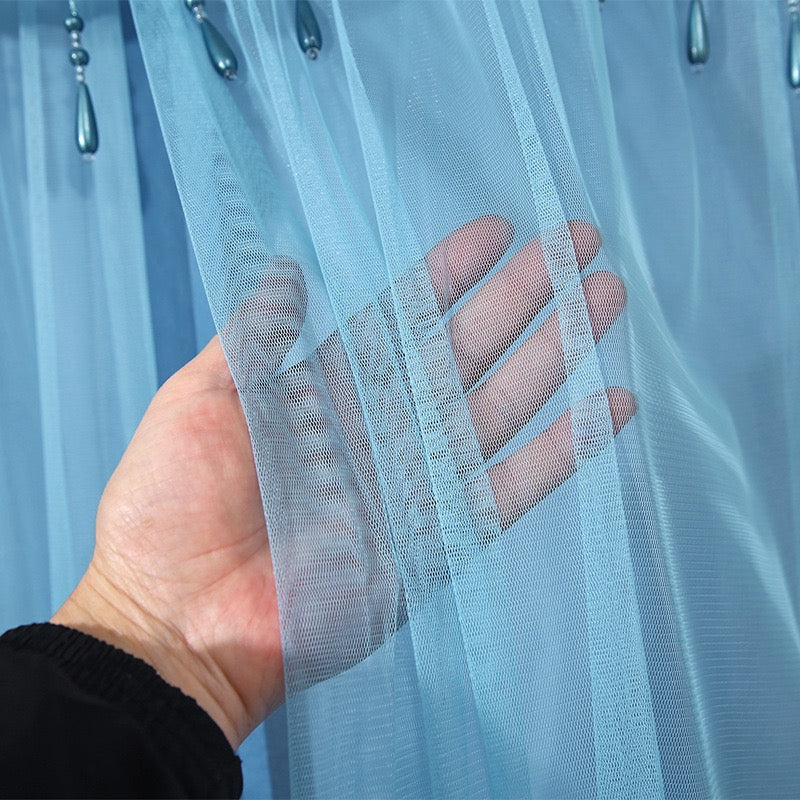 A Person is Holding Double-Layered Lace Curtain.