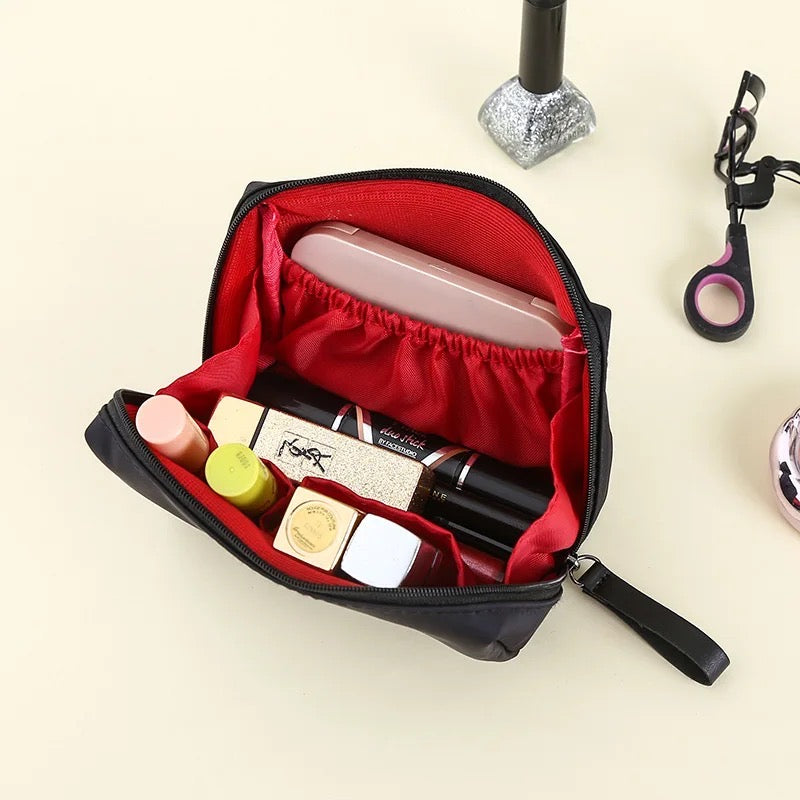 Portable Waterproof Solid Color Cosmetic Bag Toiletry Storage Pouch with some items in it