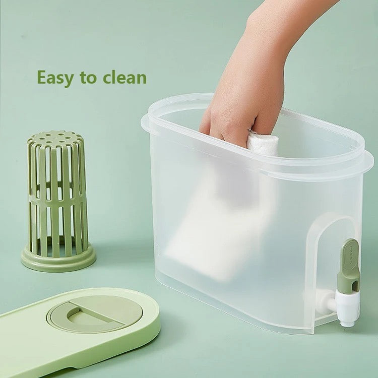 A person cleaning a 4L capacity cold kettle beverage dispenser