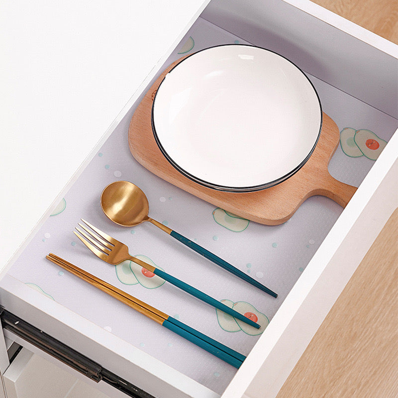 Anti-slip mat liner sheet in white drawer with utensils
