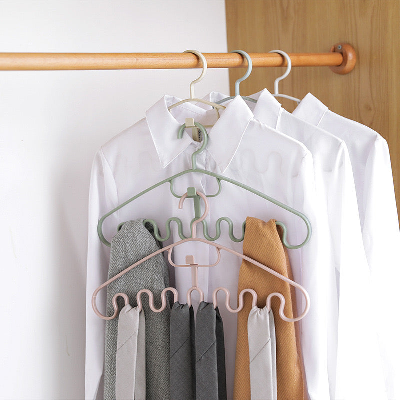 a group of Wave Pattern Stackable Hanger Clothes