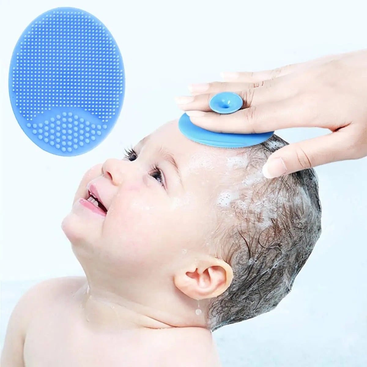 A baby is being bathed with using the Kids Soft Silicone Shower Brush, a gentle and effective tool for deep pore cleaning and exfoliating skin care