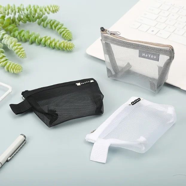 A compact Mini Zipper Pouch, designed for convenient storage and organization of small items