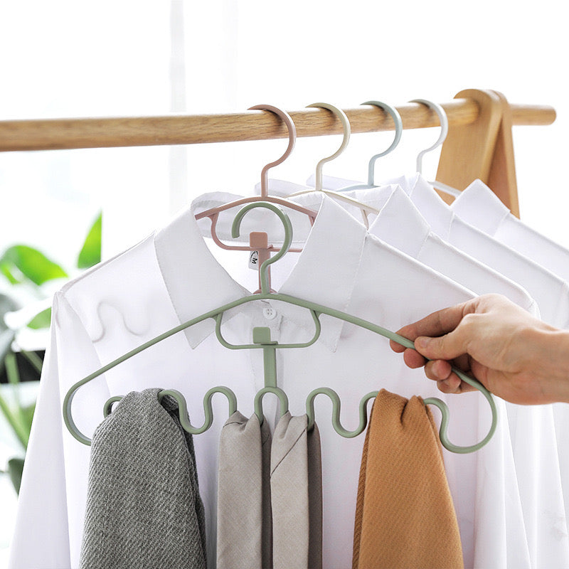 a group of Wave Pattern Stackable Hanger Clothes