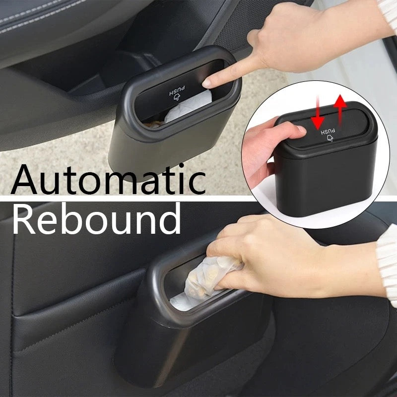 A person putting trash in Hanging Vehicle Garbage Storage Box - Showcasing its automatic rebound feature