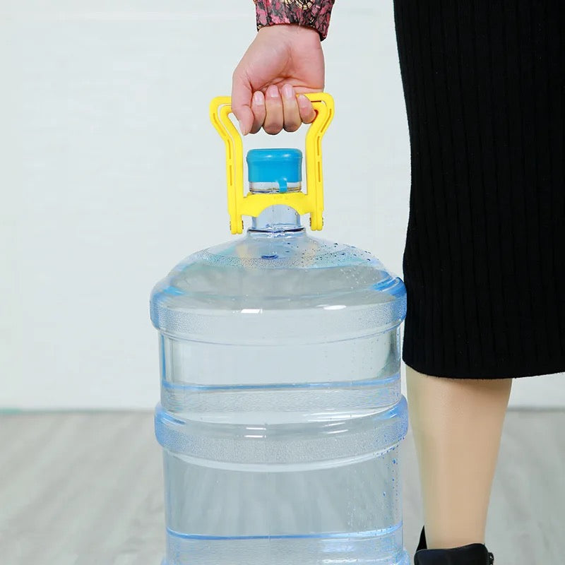 A person lifting a heavy Water can with help of Water Can Bottle Lifter