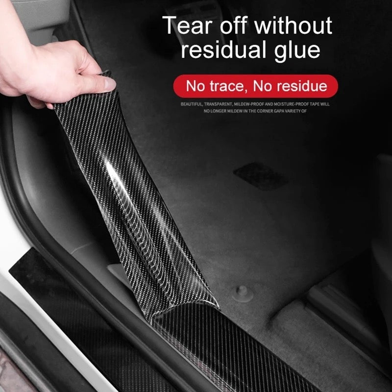 A person tearing off Anti-Scratch 5D Carbon Fiber Stickers from a car foot step