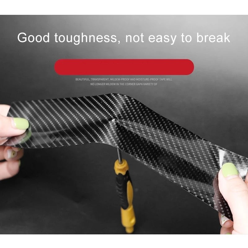 A person placing Anti-Scratch 5D Carbon Fiber Stickers on the edge of a screw driver to display it's toughness