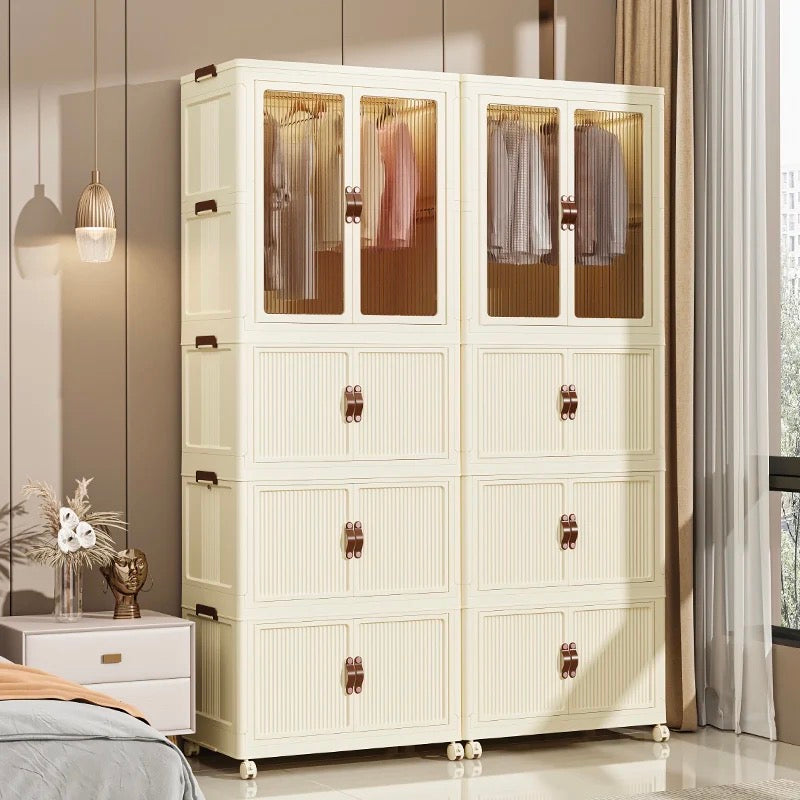 Portable folding storage cabinet with wheels placed on the floor next to the window