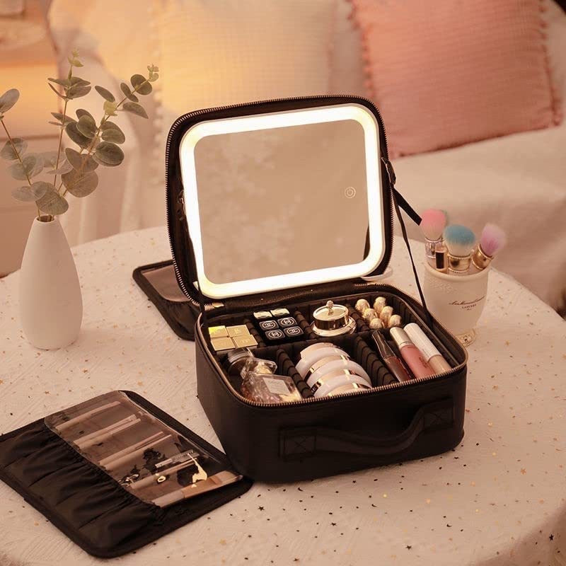 A portable travel makeup cosmetic organizer bag and other makeup items on a table