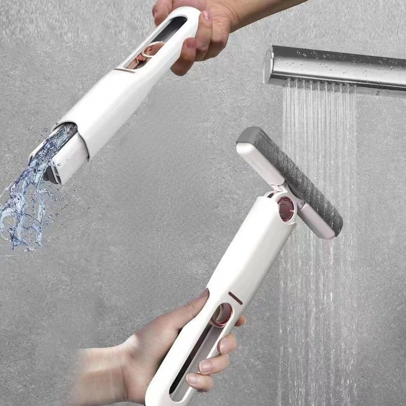 Someone holding and cleaning the Multi-Purpose Self-Squeeze Mini Mop