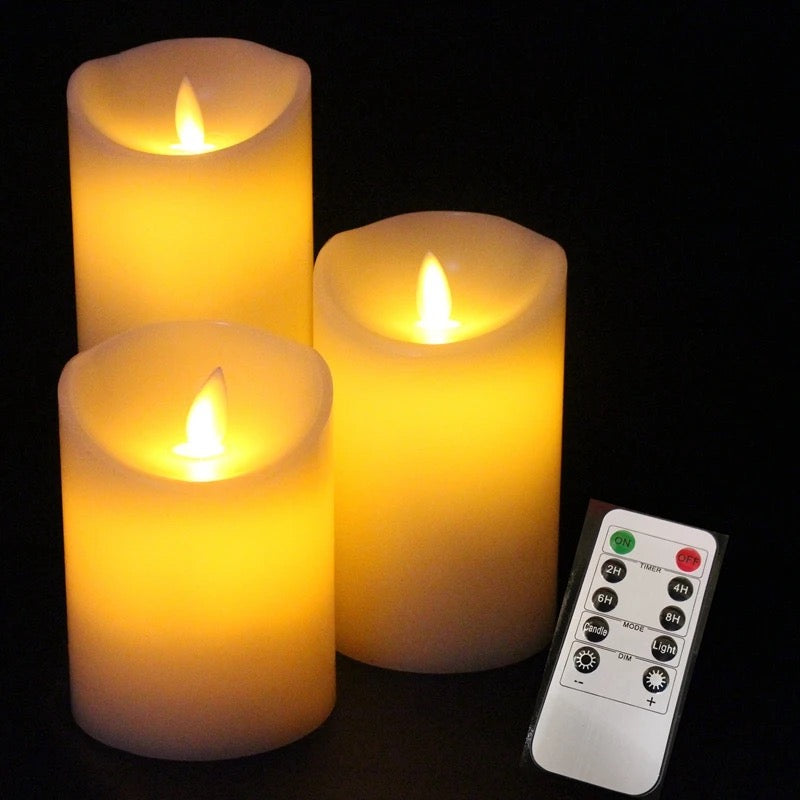 Showcasing 3 Flameless LED Candles lit up in 3 different sizes along with it's remote control