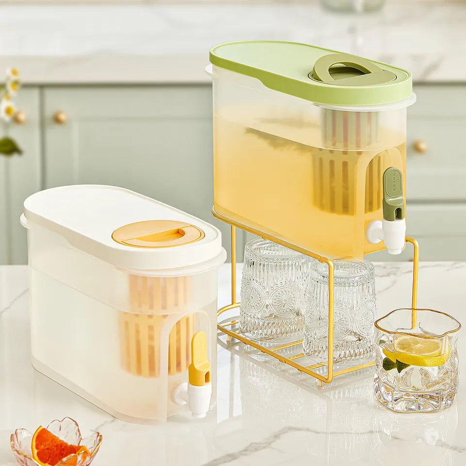 A Cold Kettle Beverage Dispenser and a glass