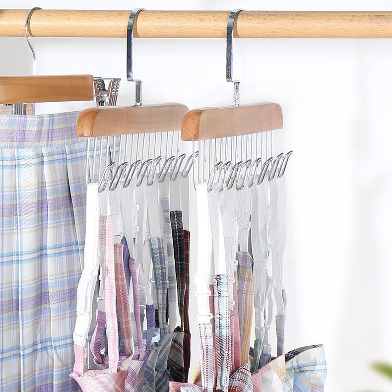 A rack with clothes hanging on 8 hooks non-slip hanger, perfect for organizing your wardrobe.