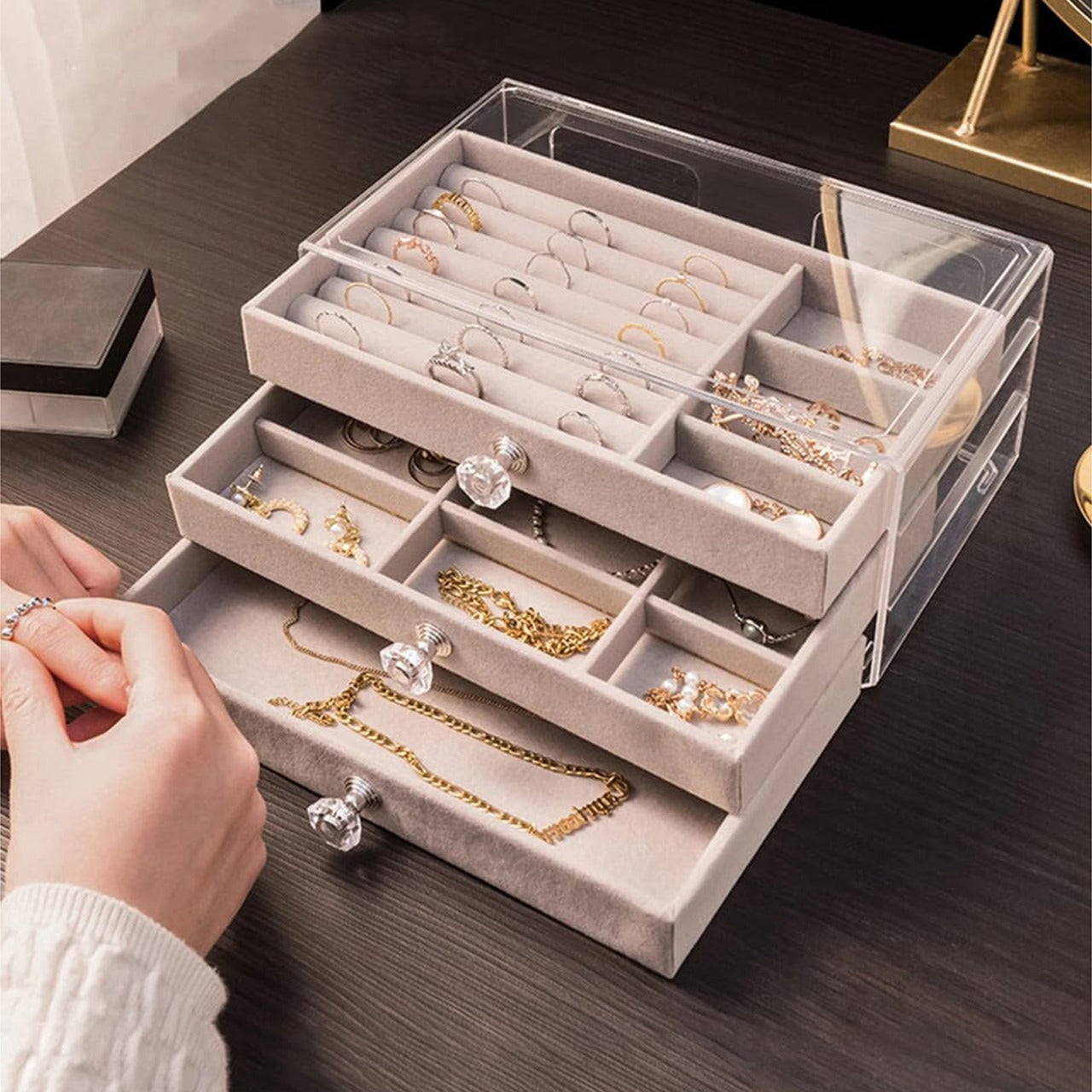 A Women is Keeping Jewelries in Jewelry Organizer Box.