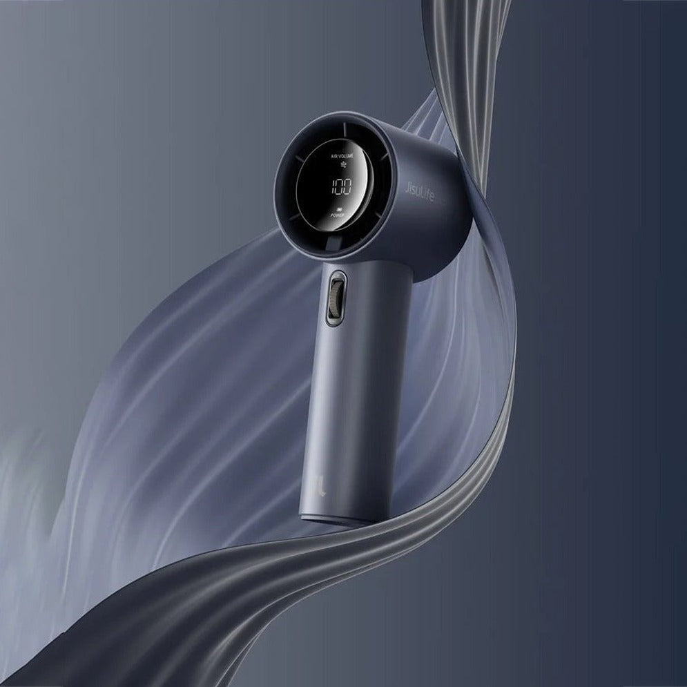 A sleek JisuLife Handheld Fan Pro1 in dark gray and black, shown against a dark blue-gray background with flowing abstract fabric-like swirls.