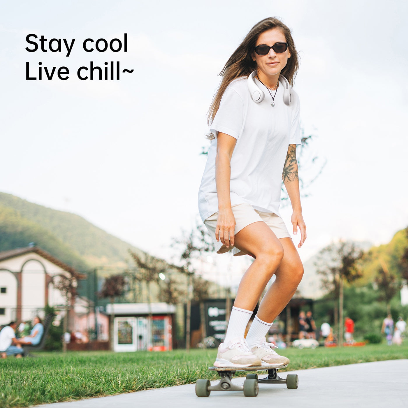 A Woman is Wearing Jisulife Neck Fan Life 3 While Skating.