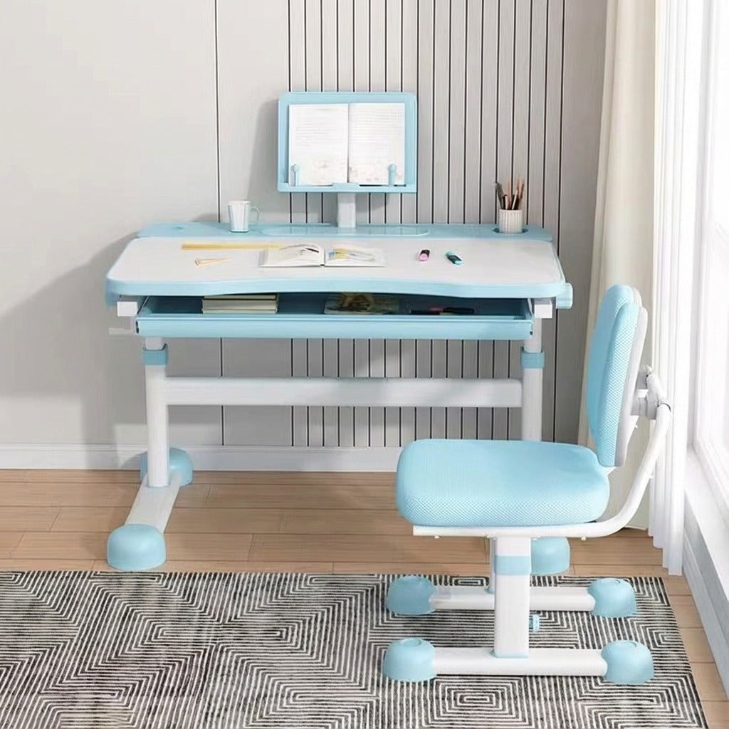 A Kids Study Desk and Chair Set is Organized in a Kids Room with Study Essentials.