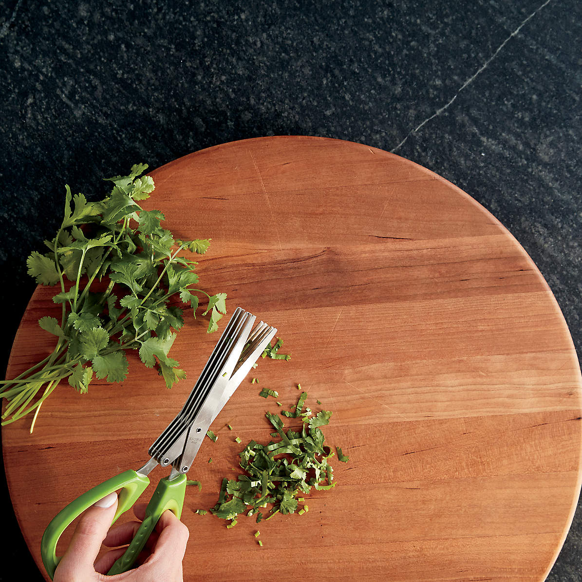 Coriander is cutting with Stainless Steel 5 Blade Kitchen Scissor.