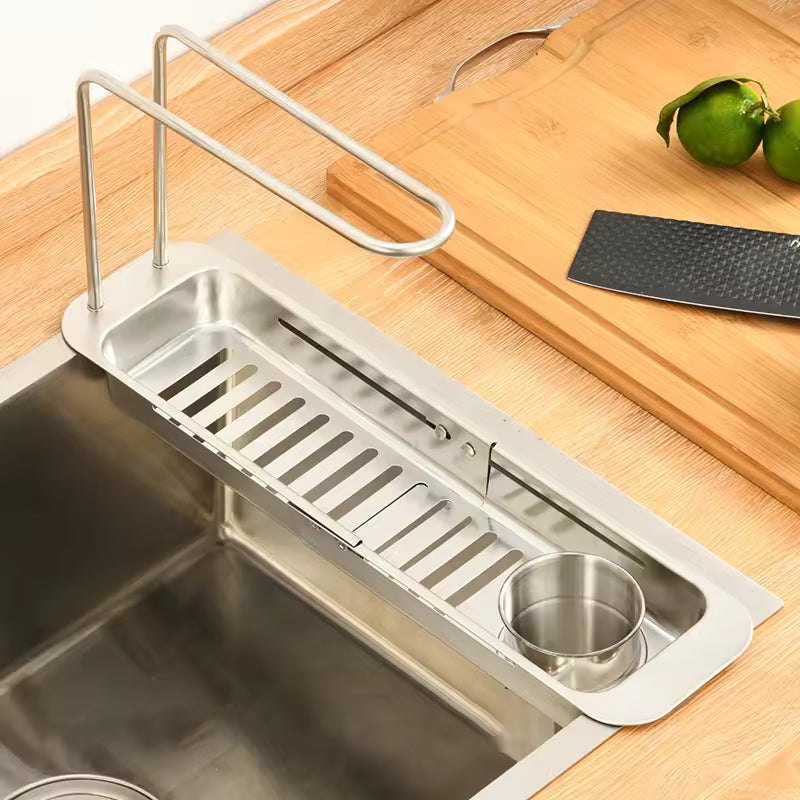 A Kitchen Sink Organizer Storage Drain Rack is Attached on Kitchen Sink.