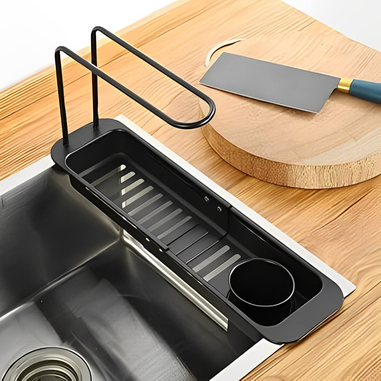 A Kitchen Sink Organizer Storage Drain Rack is Attached on Kitchen Sink.