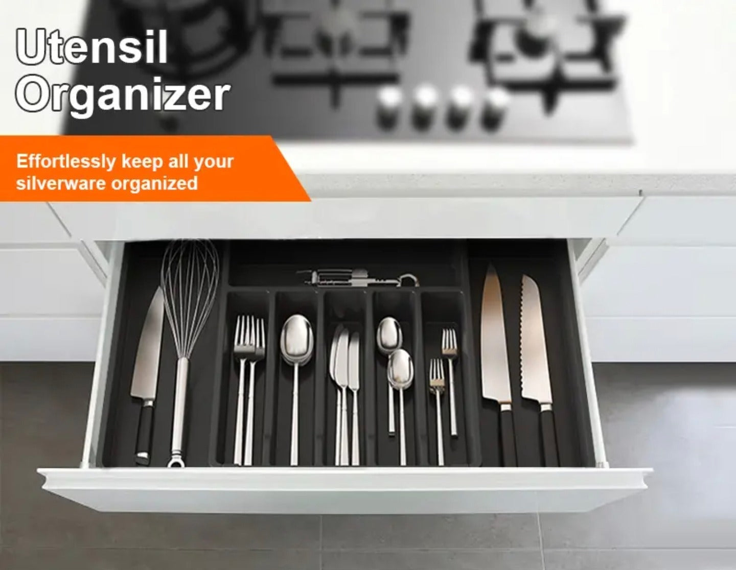 Kitchen Tableware Storage Box inside a drawer showing neatly organized knives, spoons, forks, and cooking utensils in multiple compartments.