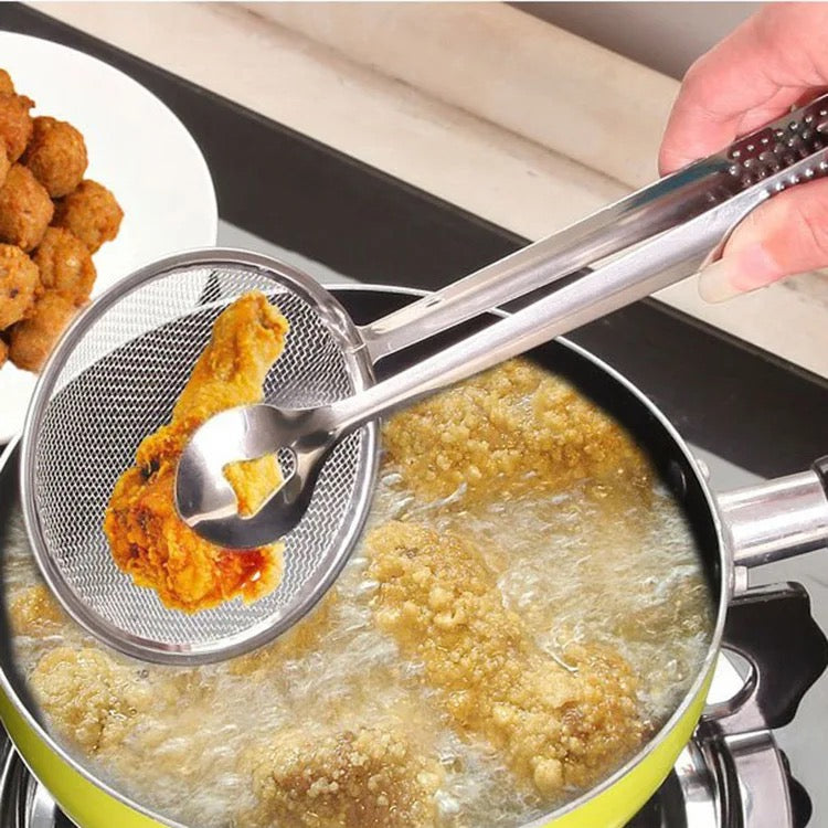 A Person is Frying Chicken Using Stainless Steel Strainer.